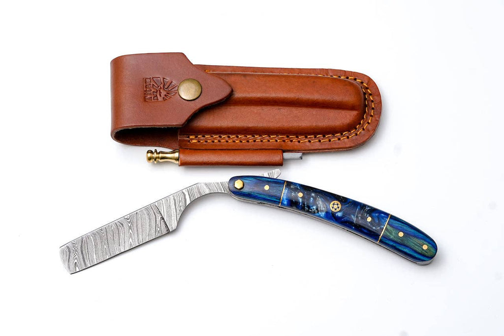 Damascus straight razor with blue resin handle